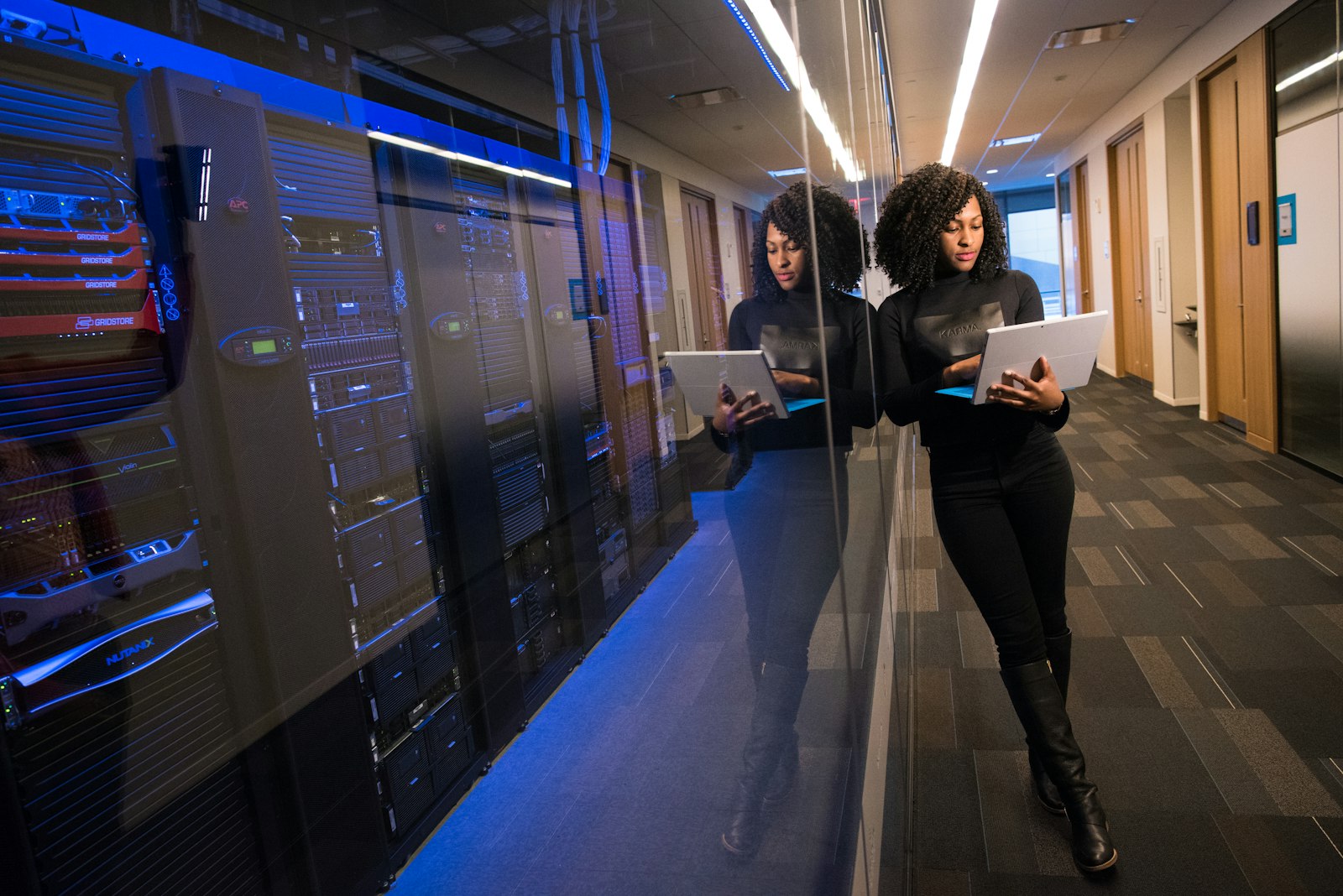 IT professionals reviewing systems in a data center